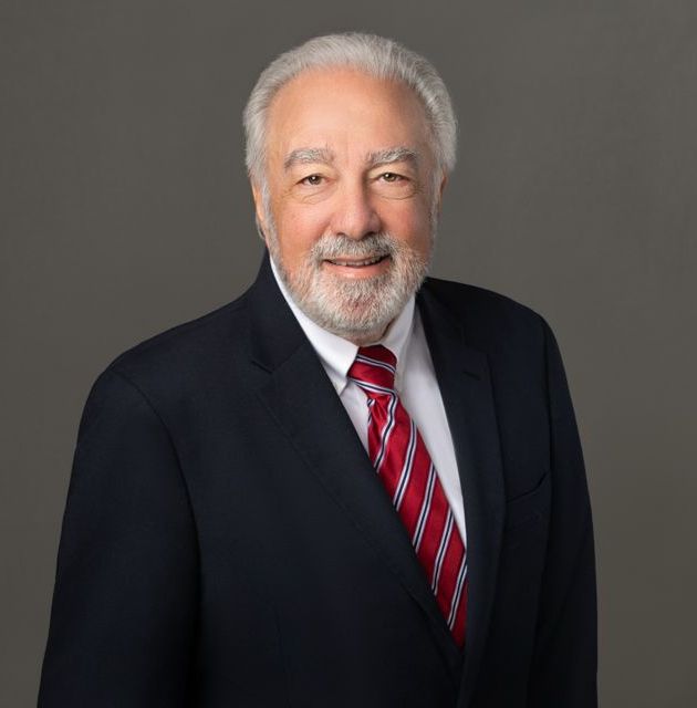 Thomas Garabedian wearing a suit and tie